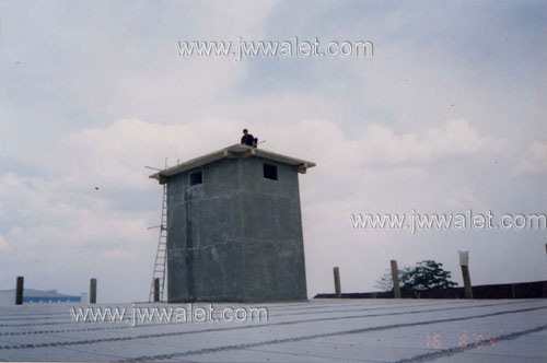 Pemasangan spray luar di menara, lokasi Banjarmasin